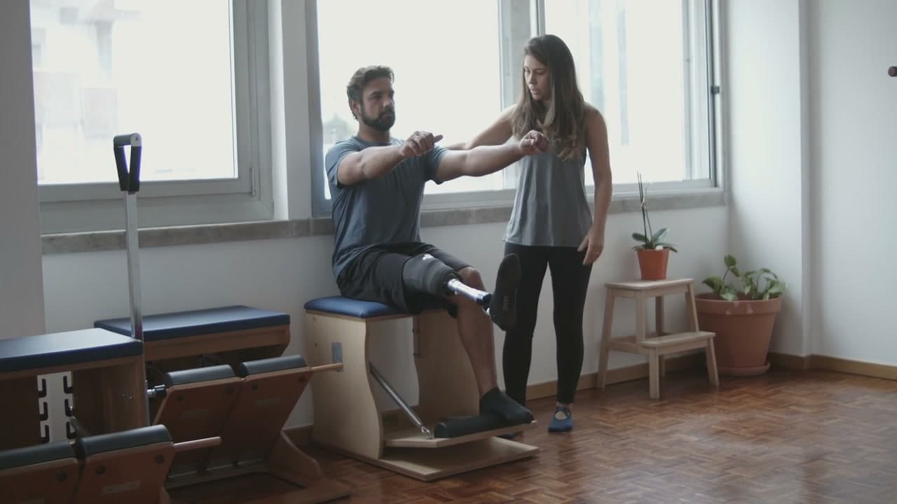 Occupational therapist conducting functional capacity assessment in home environment